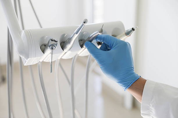 Professional Tooth Extraction technician working in Goshen, AR